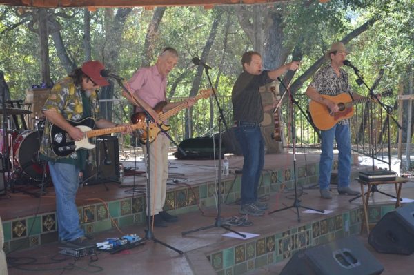 Musicians play guitar and bass in the music pavilion at Ojai Valley Lavender Festival 2016
