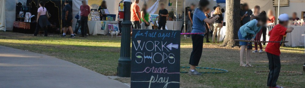 Sign advertisitng DIY workshops outside outdoor tents as Pasadnea Jackalope Fair
