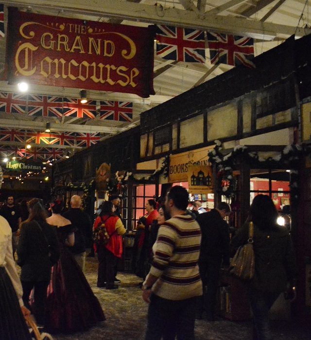 Shoppers walk by the Grand Concourse during the 2014 Dickens Fair