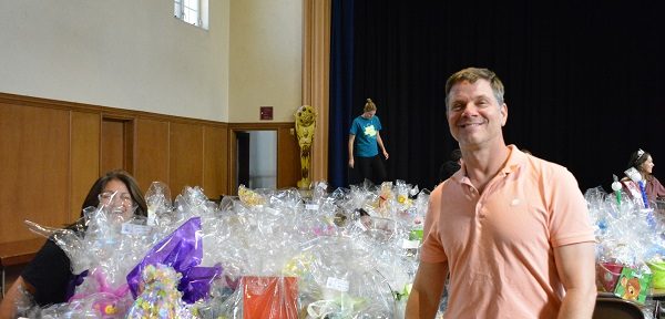 Long Beach Chief Inspiration Officer Justin Rudd with Easter baskets
