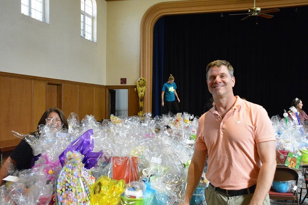 Long Beach Chief Inspiration Officer Justin Rudd with Easter baskets