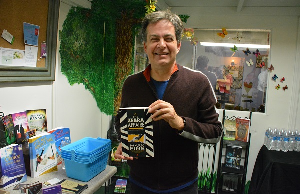 Author Mark Fine with his book The Zebra Affaire