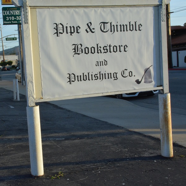 Pipe and Thimble bookstore sign