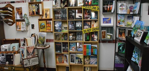crime fiction with police tape display