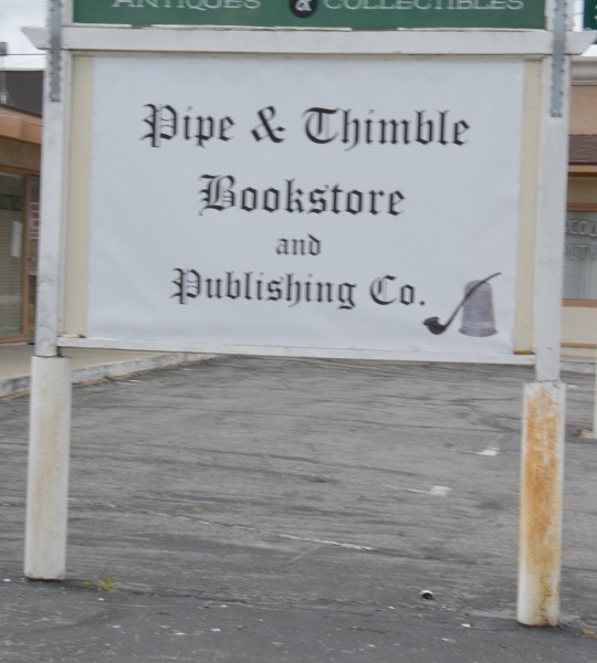 Pipe and Thimble Bookstore sign