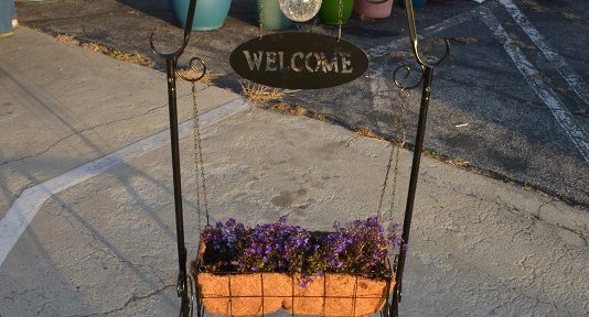 "Welcome" sign outside Pipe and Thimble