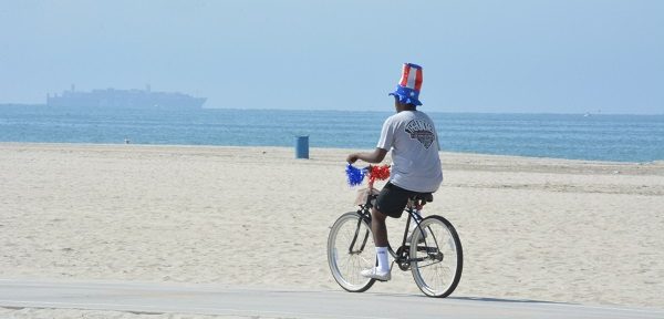 Parade participant in Uncle Sam hat