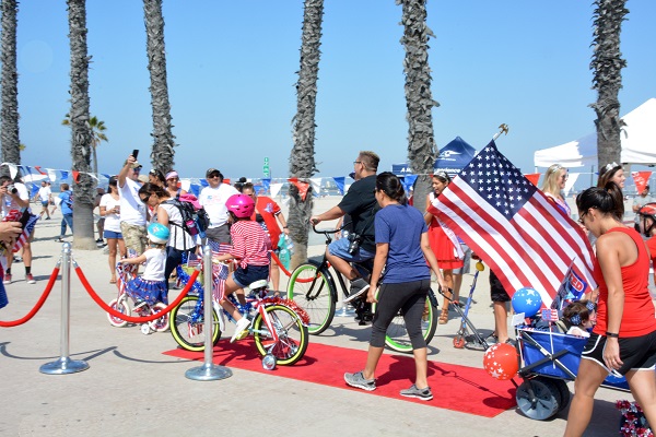 Long Beach 4th of July Bike Parad with flag