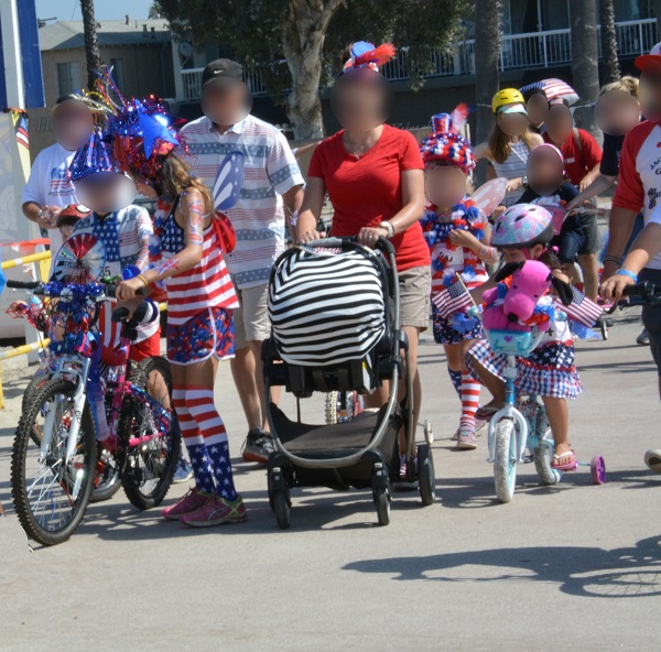 parade participants in red white and blue costumes