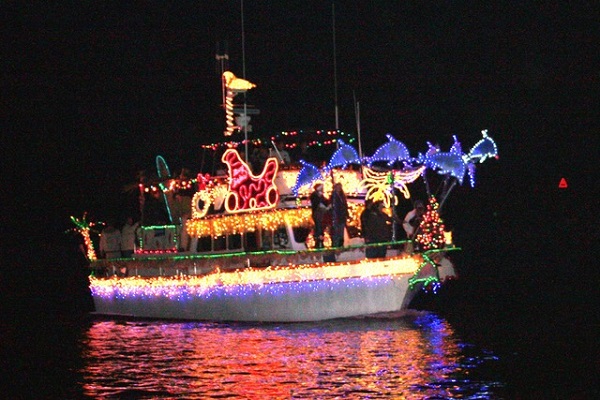 Lighted boat on water at night