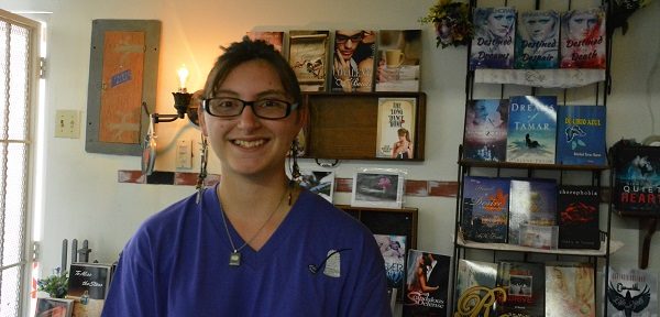 Author Ellie Lieberman smiles in Pipe & Thimble bookstore
