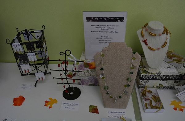 Handcradted necklaces on a display table