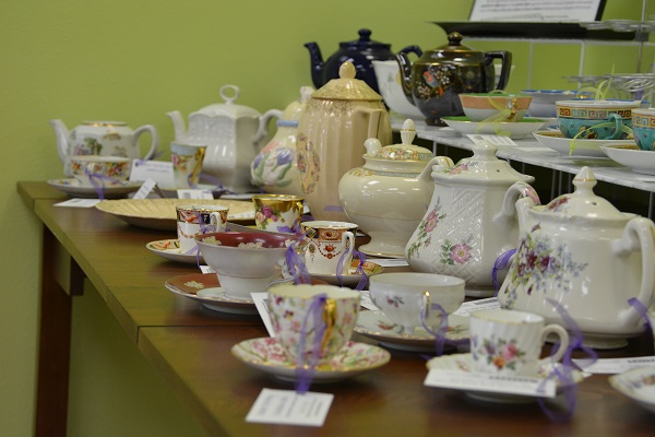 teapots and cups on a table