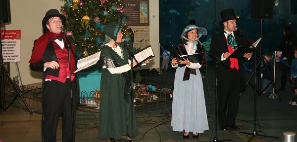 Christmas carolers singing at the Aquarium of the Pacific