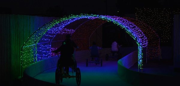 ice tricycles go through multilit tunnel