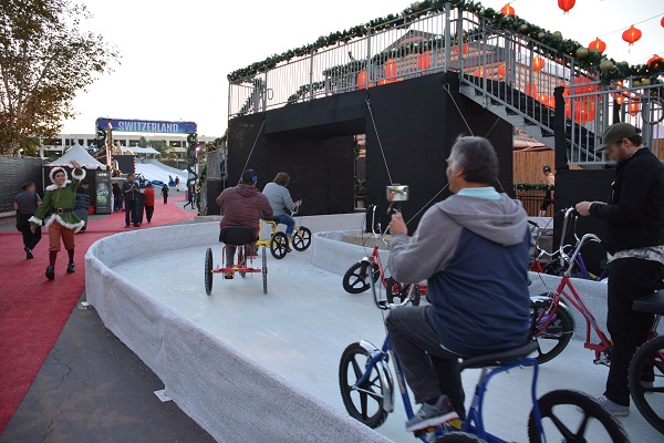 People ride ice tricycles at CHILL