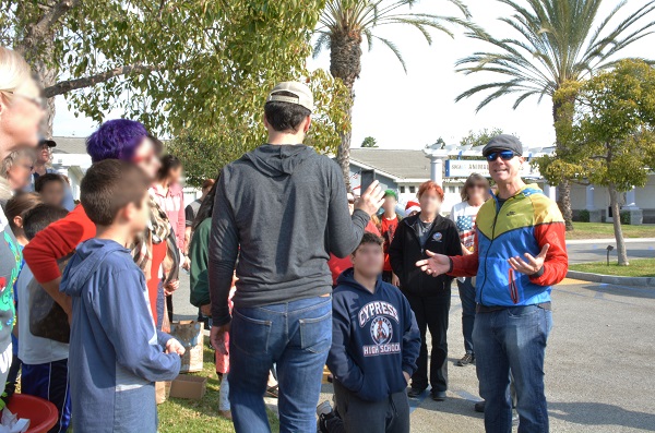 Justin Rudd addresses Operation Santa Paws group outside Long Beach Animal Care Services