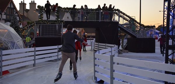 skaters skate through CHILL on an ice-skating track