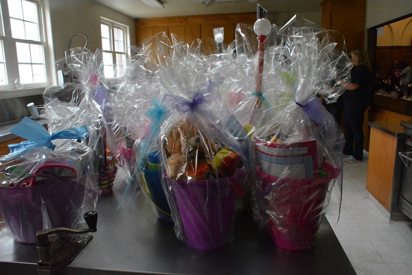 Wrapped Easter baskets sit on a kitchen counter