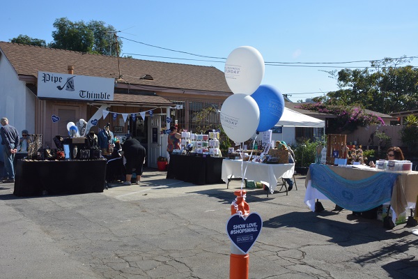 Pipe & Thimble Bookstore with ballons and Small Business Saturday tables
