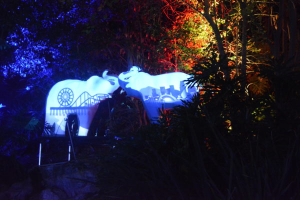 Elephant cutout with Santa Monica ferris wheel projected on it in lights
