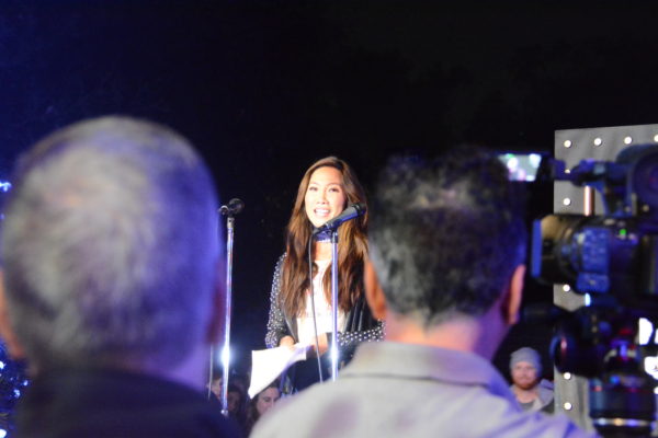 Anchoer Julie Chang speaks to L.A. Zoo Lights crowd