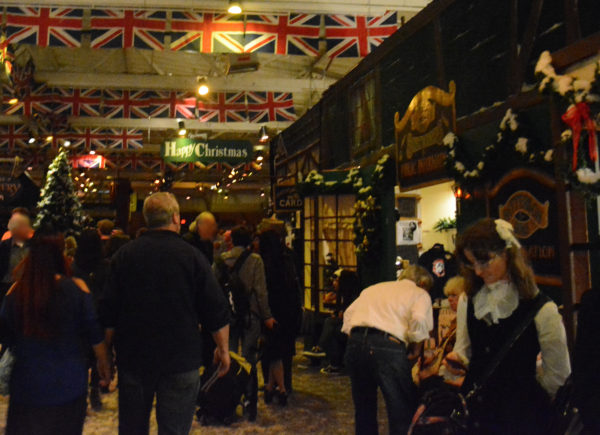 Visitors walk down the main concourse at the Dickens Christmas Fair