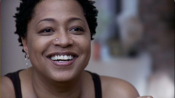 Singer Lisa Fischer smiles for the camera in closeup.