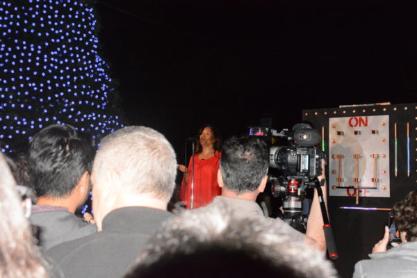 L.A. Zoo Acting Director Denise Verret speaks to L.A. Zoo Lights audience prior to tree lighting
