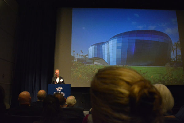 Duncan Ballash shows audience a slie of Aquarium facade