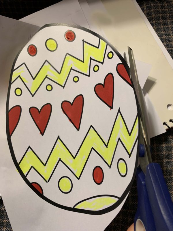 Paper Easter egg being cut out