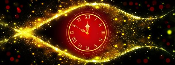 Clock with red dial showing ten minutes till twelve in cente of arcs of gold sparkles