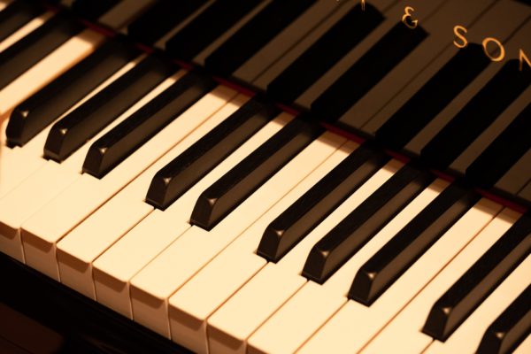 Closeup on piano keyboard