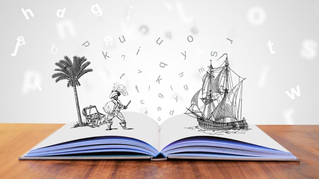 A pop-up pirate ship and pop-up island with palm trees emerge from te pages of an open book