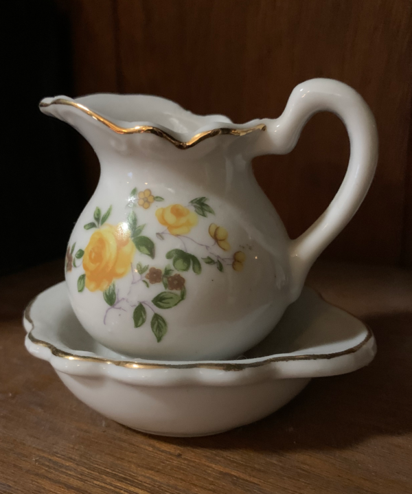 Miniature white china pitcher and washbasin ornament with yellow flowers
