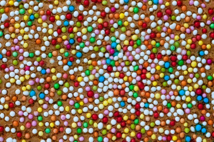 Closeup of gingerbread dough with multicolored sprinkles