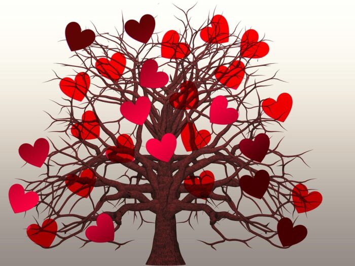 Painting of a tree with red hearts blooming from every branch.