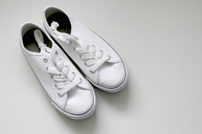 White athletic shoes with laces