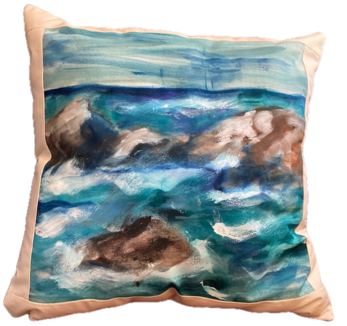 Mixed media pillow of blue ocean with beige rocks