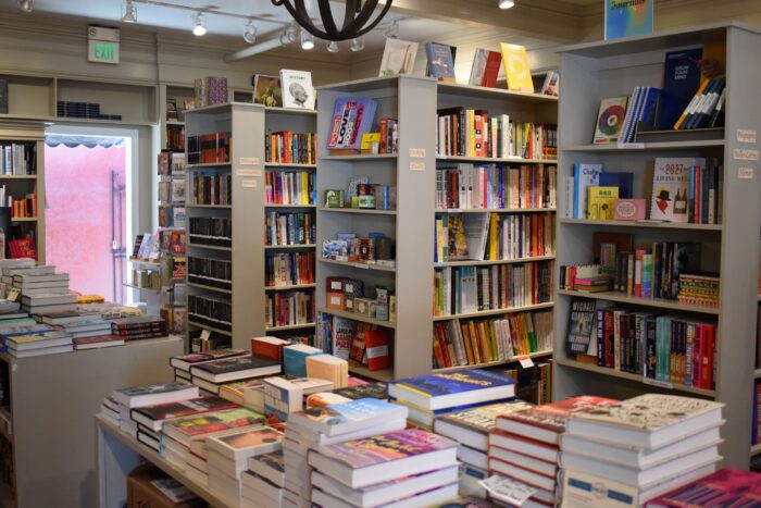 Books on display in DIESEL, in front of shelves filled with books